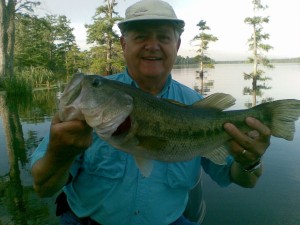 The man in the rear of the boat